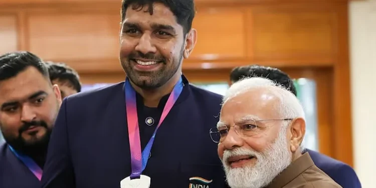 Prime Minister Narendra Modi laughed as he listened to the story of a Pakistani player lamenting his situation.