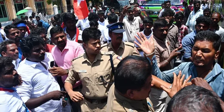 VCK members stage a road blockade in Thanjavur over the removal of a banner VCK members stage a road blockade in Thanjavur over the removal of a banner